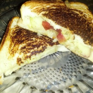 Red Macantosh Apples, Gruyere Swiss Cheese with a Drizzle of Honey Grill Cheese...